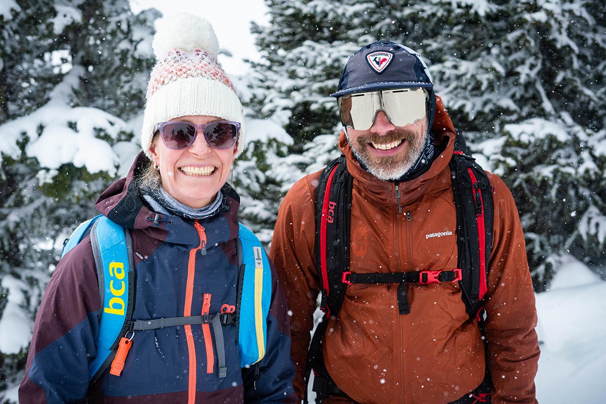Matt Pacocha ski touring with his wife on a snowy day.