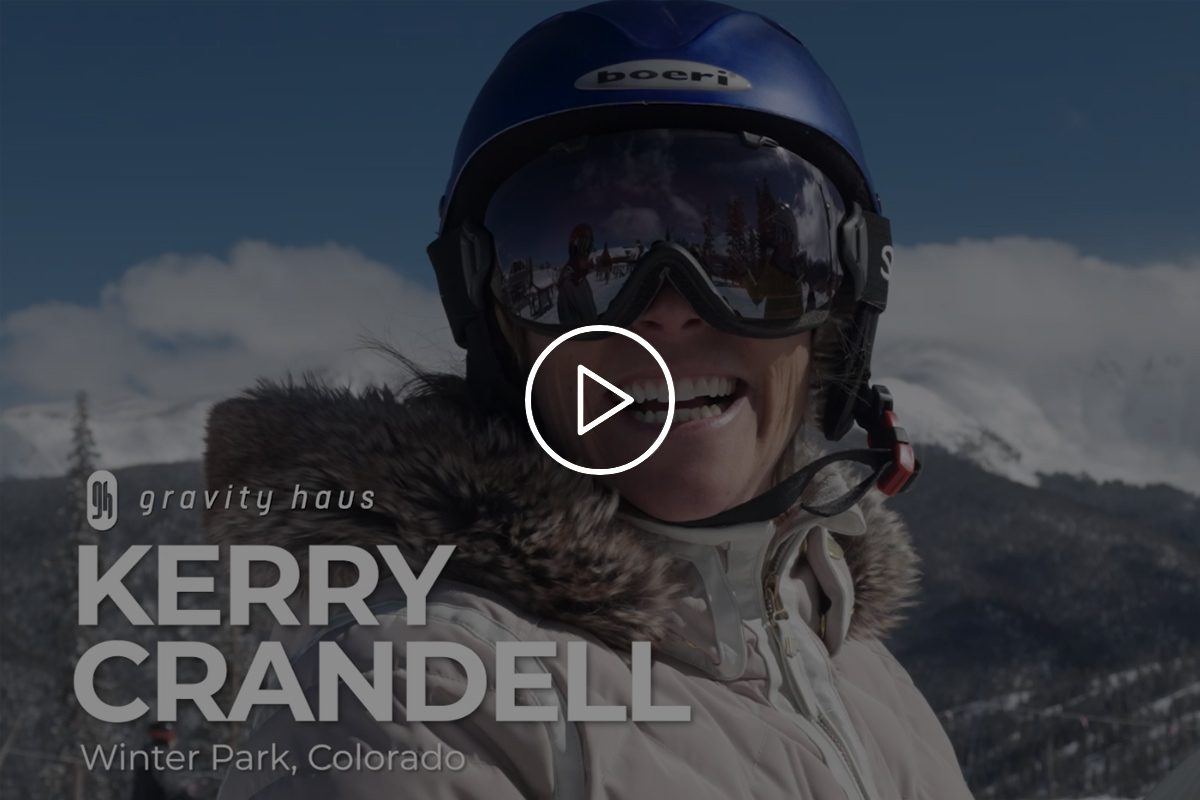 Kerry Crandell with helmet & goggles on a sunny day with Gravity Haus logo and video title overlay